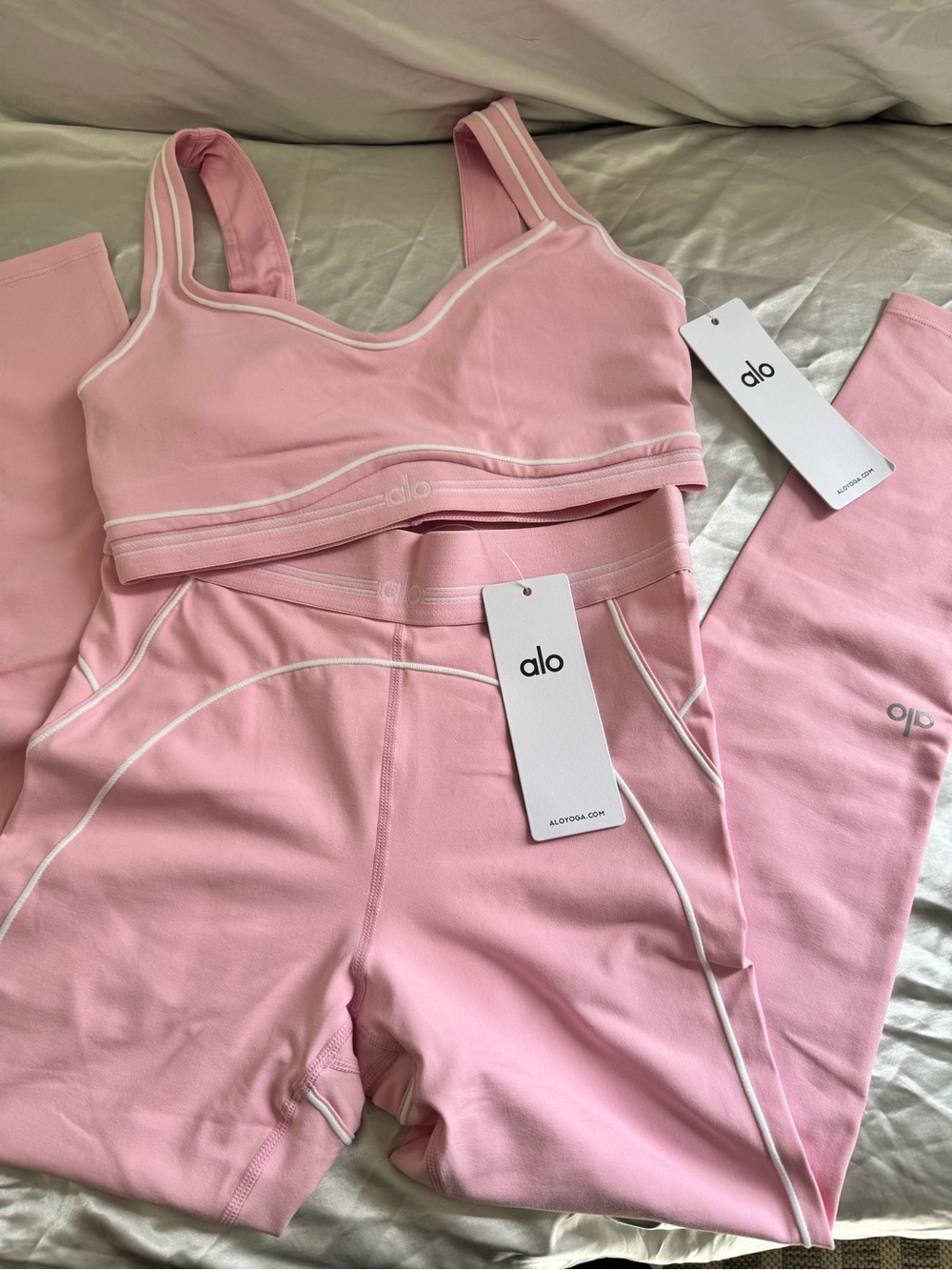 ALO Yoga Pink Piping Sports Bra and High-Rise Leggings Set